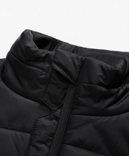 Full-zip vest with a zip-through, stand-up collar for added versatility and warmth.